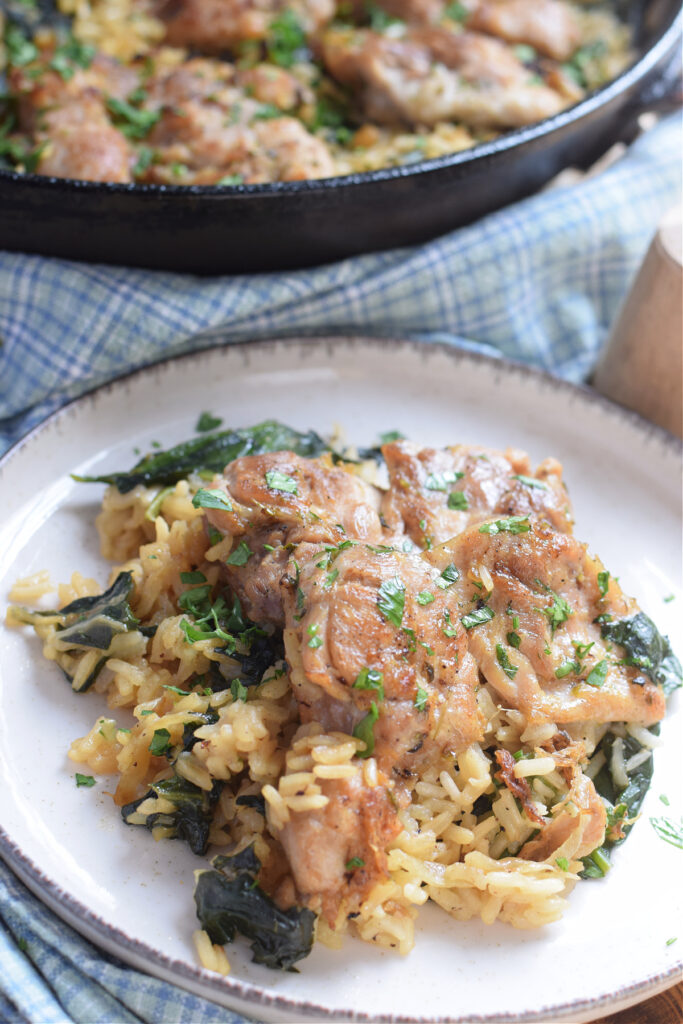 Skillet and rice on a serving dish.