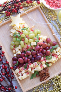 Cheese and fruit tray .