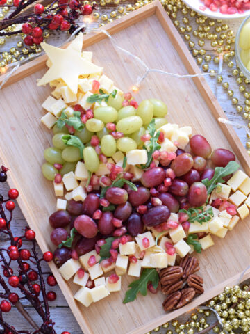 Cheese and fruit tray .