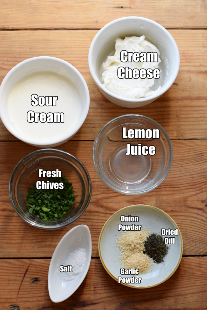 Ingredients to make sour cream and chive dip.