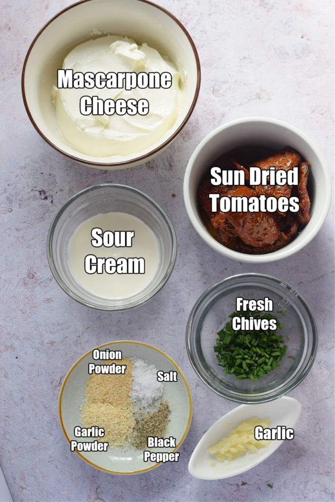 Ingredients to make sun dried tomato dip.