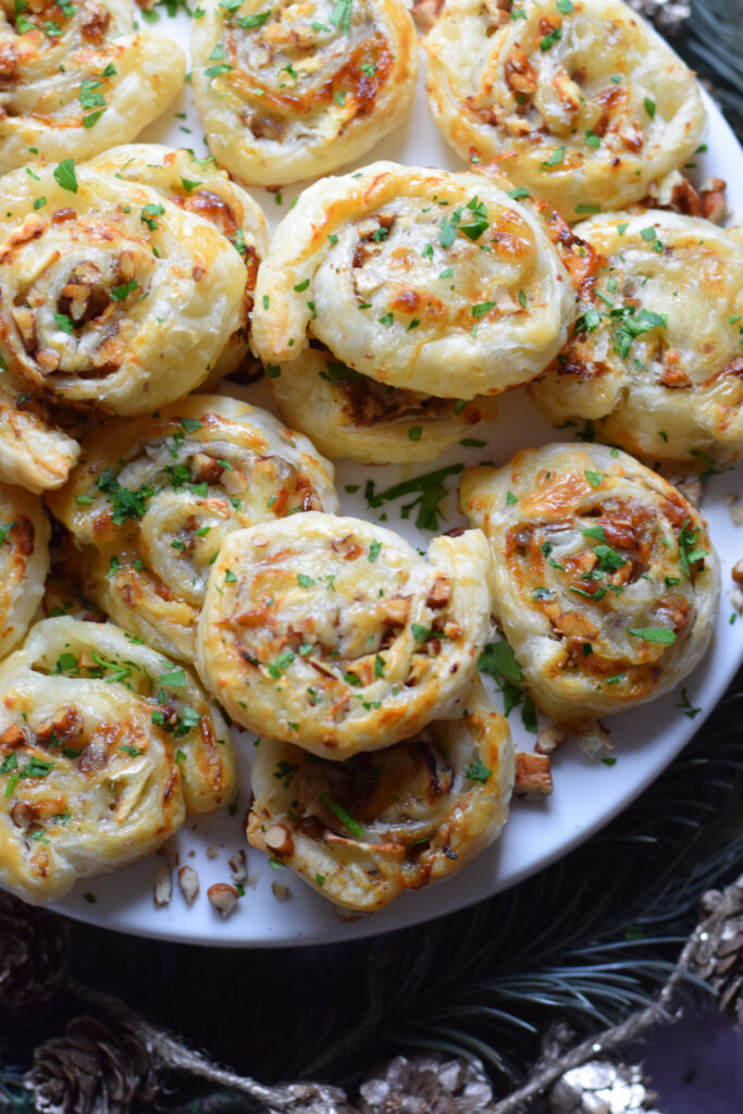 Puff pastry rolled up with goat cheese and pecans.