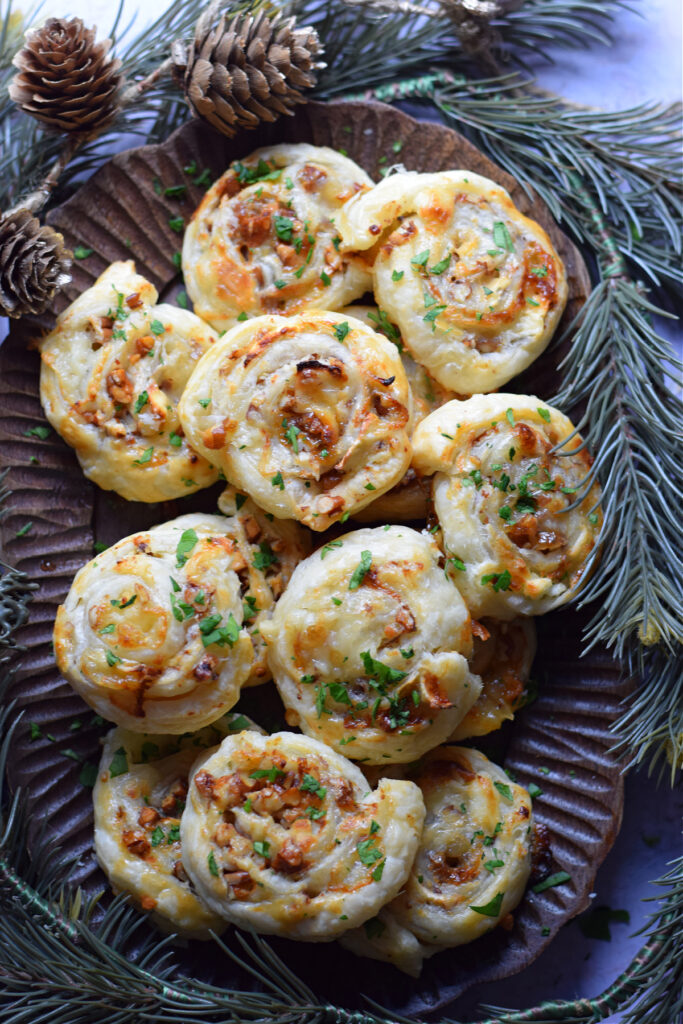 Goat cheese pecan appetizers on a plate.