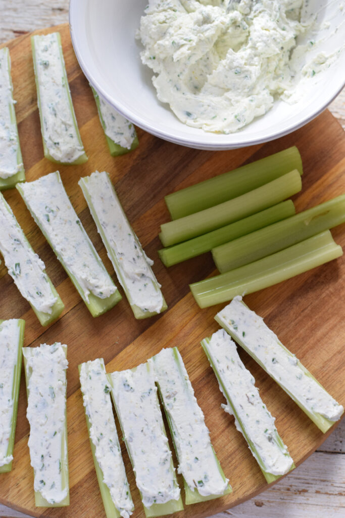 Filled celery sticks with cream cheese filling.