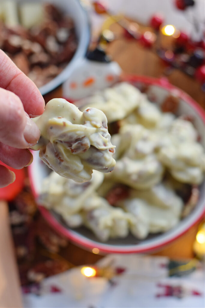 White chocolate pecan treats in a bowl.