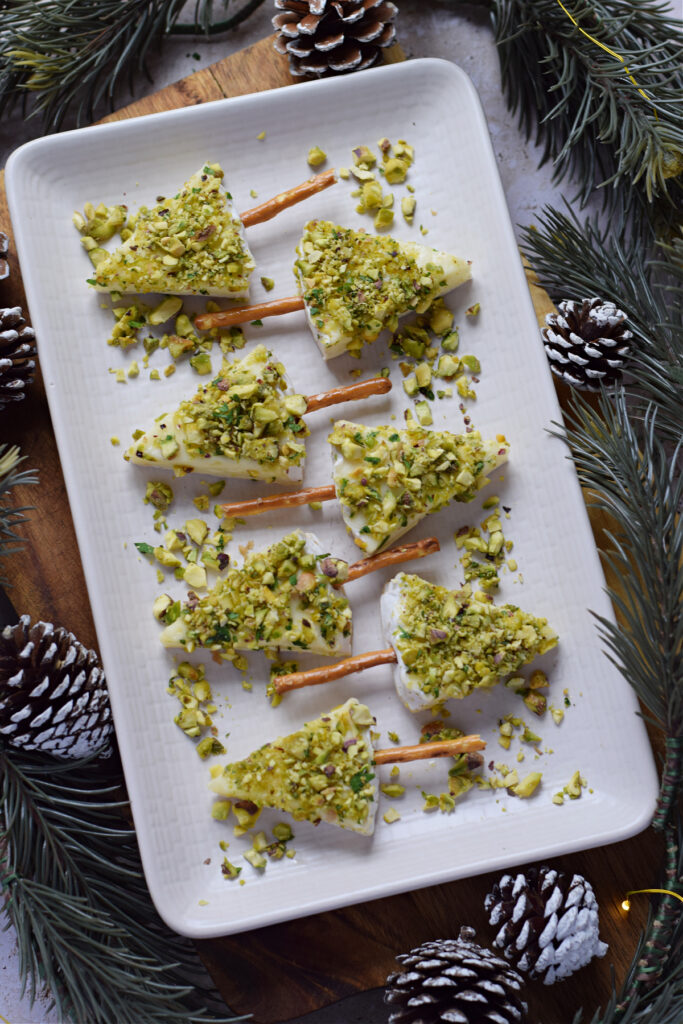 Mini christmas tree appetizers on a plate.