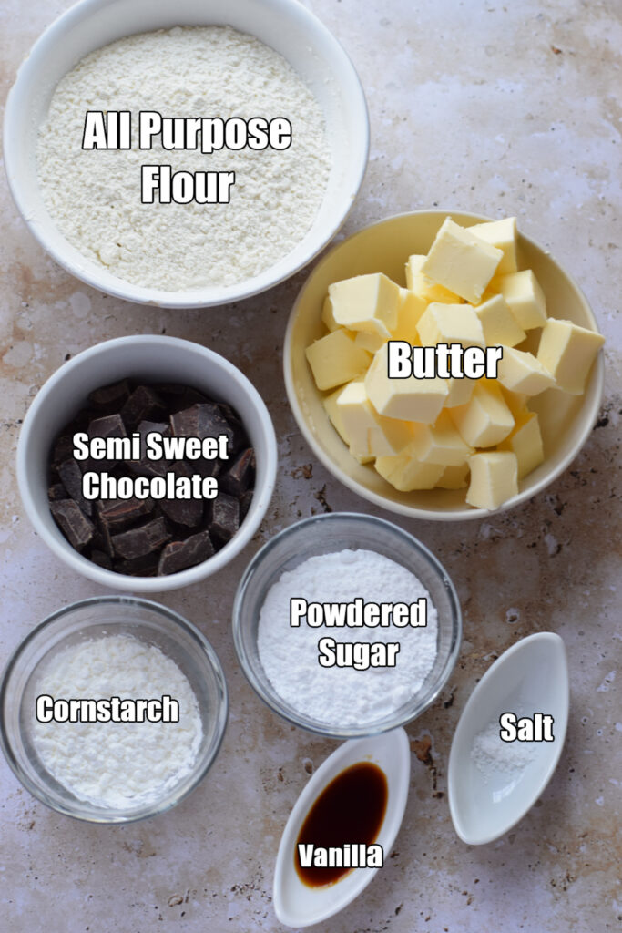 Ingredients to make chocolate dipped shipped shortbread cookies.