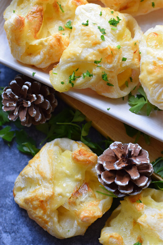 Close up of an apple and puff pastry appetizer.