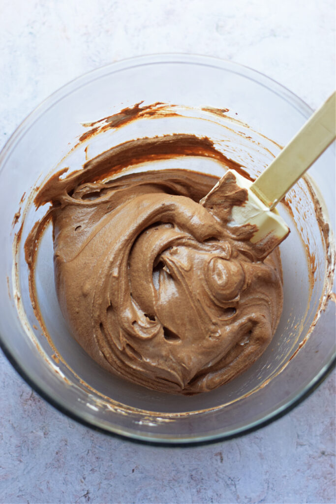 Chocolate whipped cream in a glass bowl.