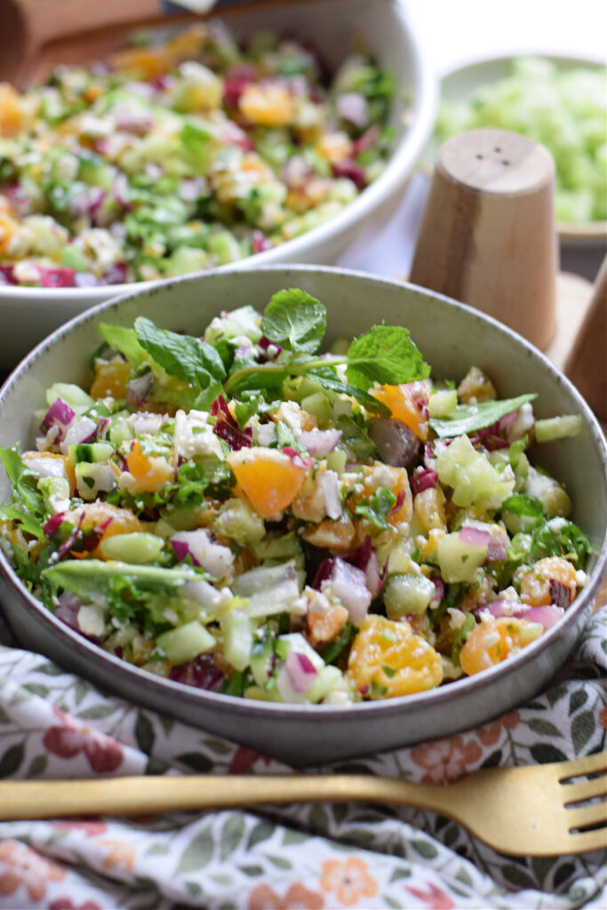 Chopped citrus salad in a small serving bowl.