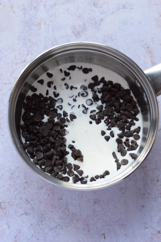 heavy cream and chocolate chips in a saucepan.