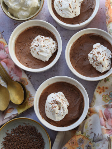 Chocolate mousse with whipped cream topping.