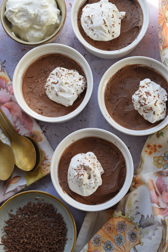 Chocolate mousse with whipped cream topping.