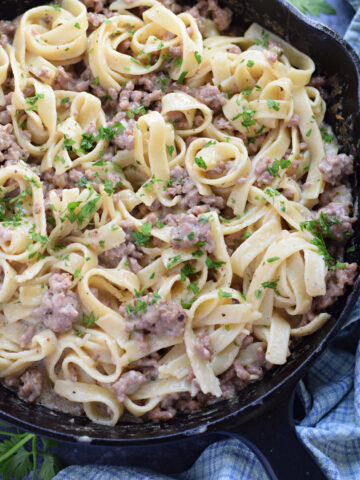 Ground beef stroganoff in a skillet.