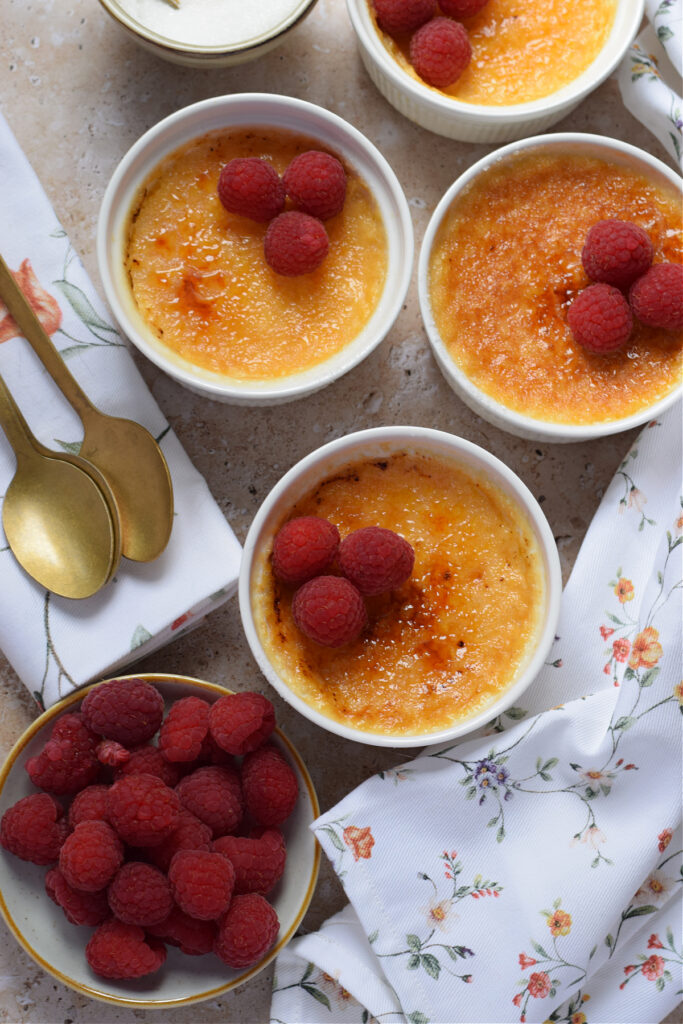 Classic creme brulee with fresh raspberries.