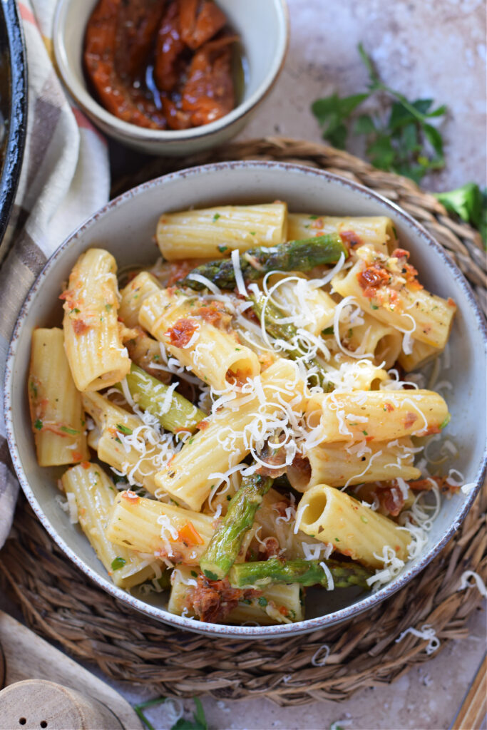 Pasta with parmesan cheese in a bowl.