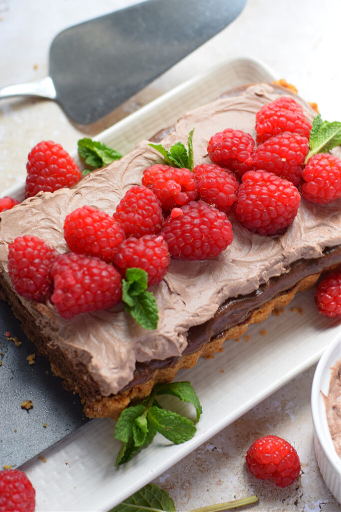 Chocolate and raspberry cheesecake tart.