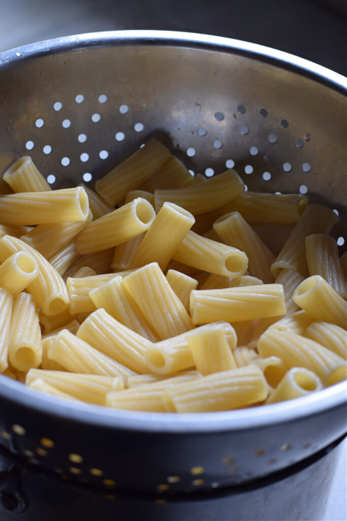 Pasta in a colander.