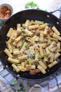 Asparagus pasta in a skillet.