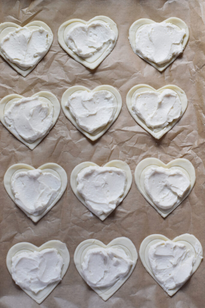 Puff pastry hearts with a cream cheese filling.