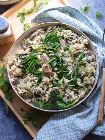 Spinach mushroom rice in a bowl.