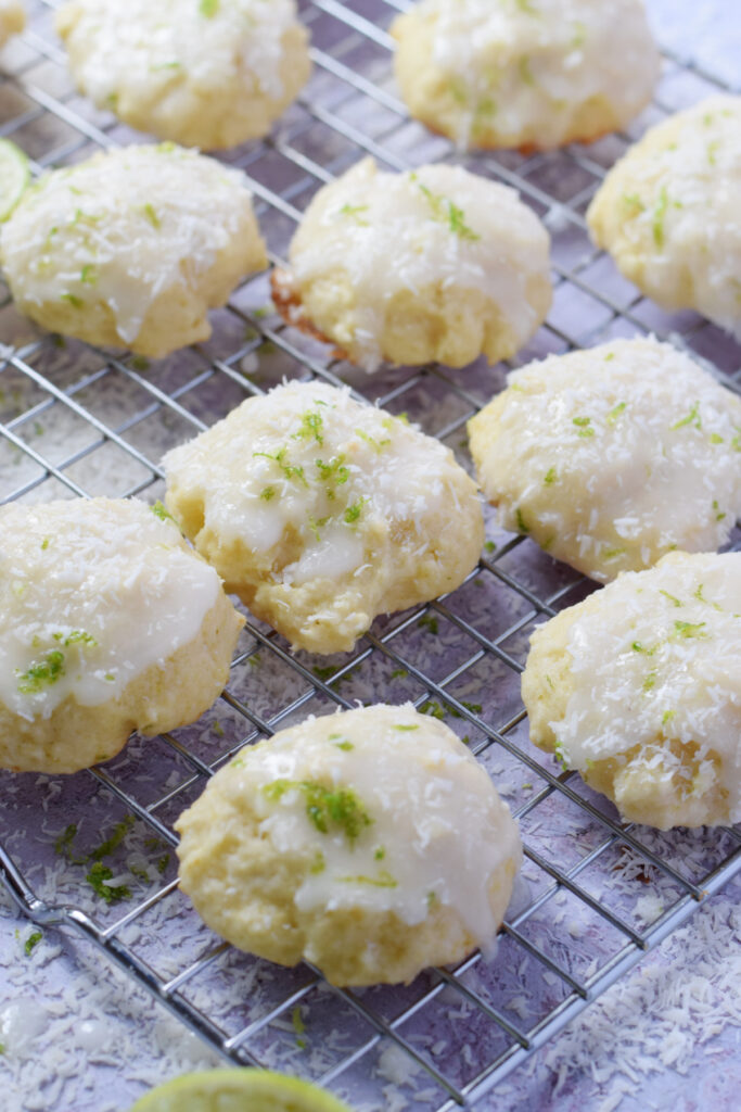 Coconut lime cookies on a rack.