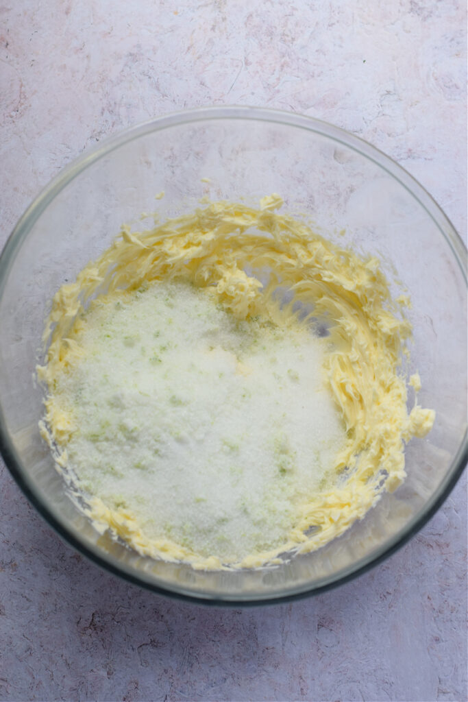 Sugar and butter in a glass bowl.