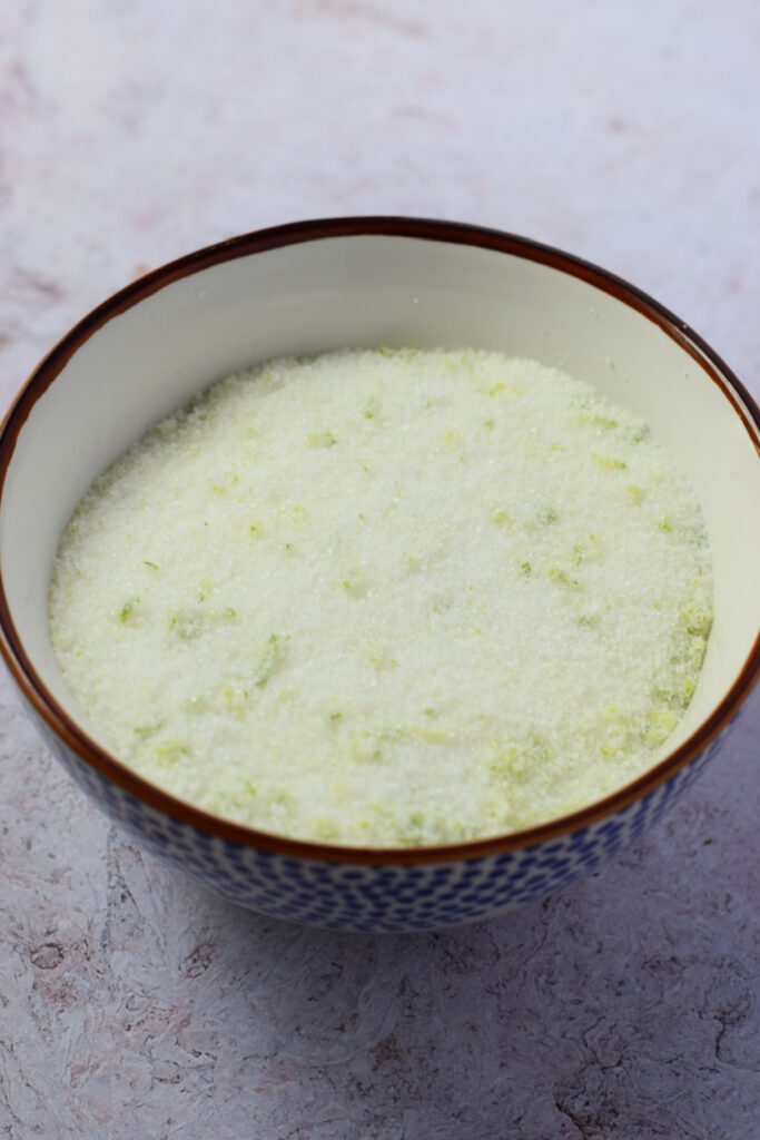 sugar with lime zest in a bowl.