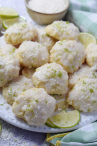 Close up of coconut lime cookies on a plate.