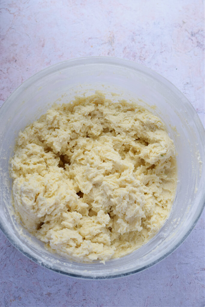 Ricotta cookie dough in a glass bowl.