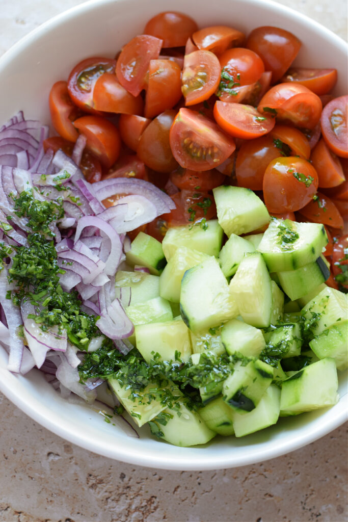 Salad in a bowl with a dressing.
