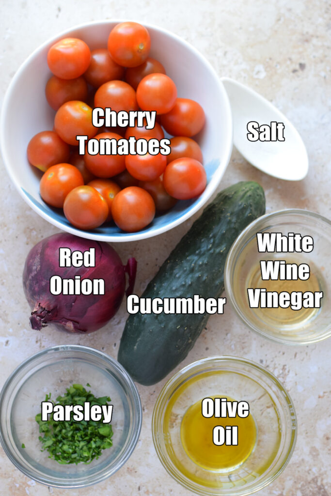 Ingredients to make the cucumber tomato salad.