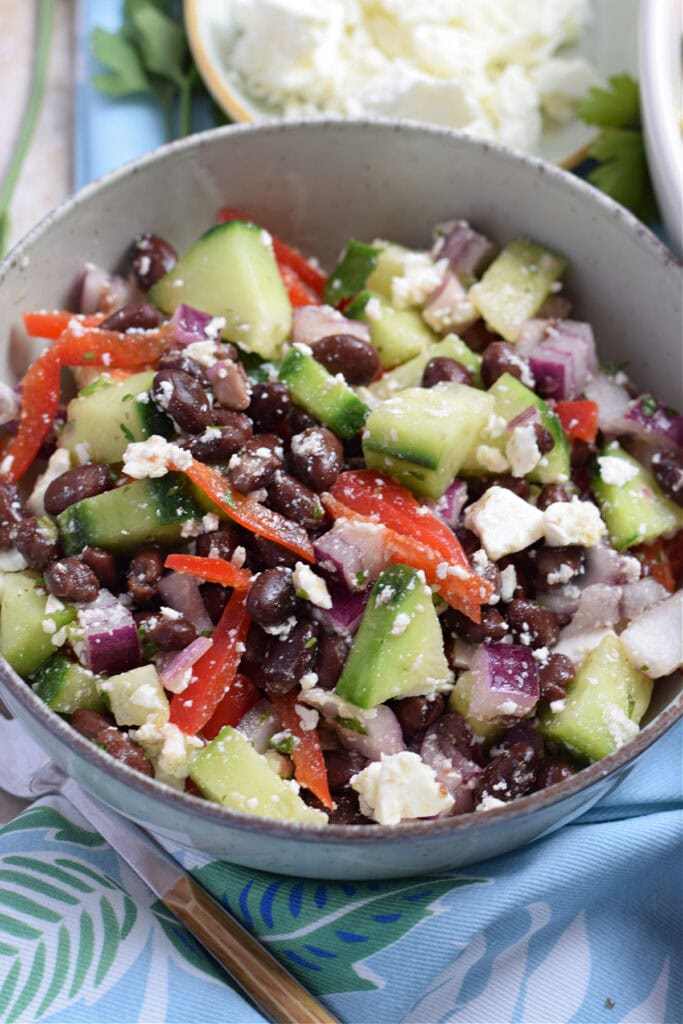 Close up of black bean cucumber feta salad.