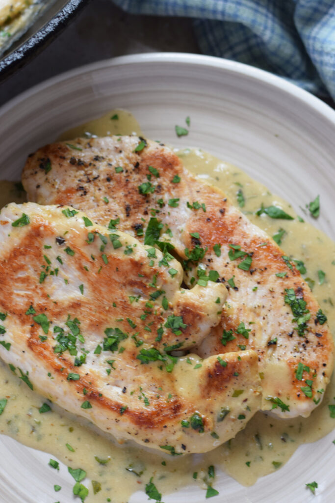 Turkey cutlets in a sauce.