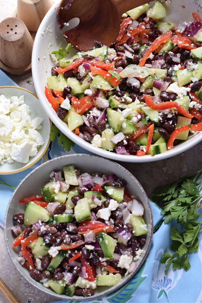 Summer salad in serving dishes.