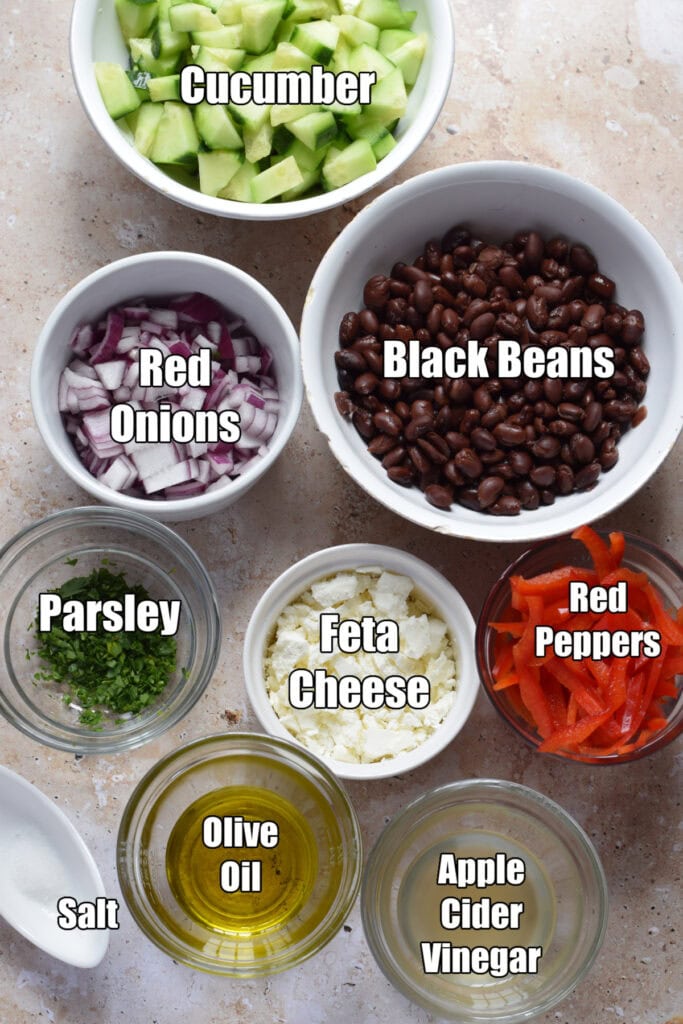 Ingredients to make black bean feta salad with cucumbers.