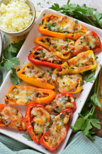 Mini peppers on a white plate.