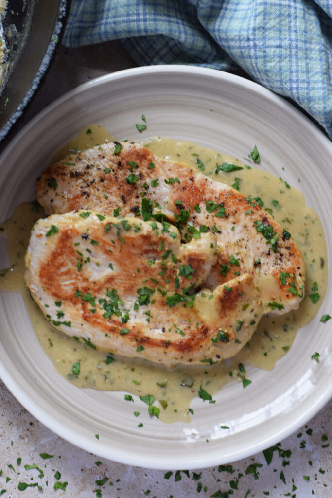 Turkey cutlets in a creamy sauce.