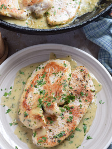 Turkey cutlets cooked in a creamy mustard sauce.