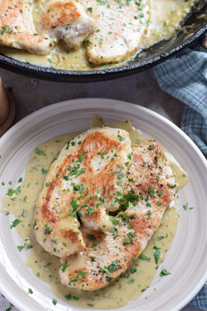 Turkey cutlets cooked in a creamy mustard sauce.