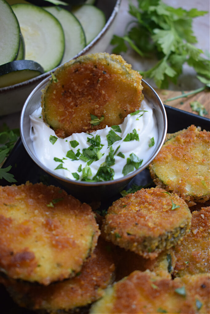 Fried zucchini in a dip.