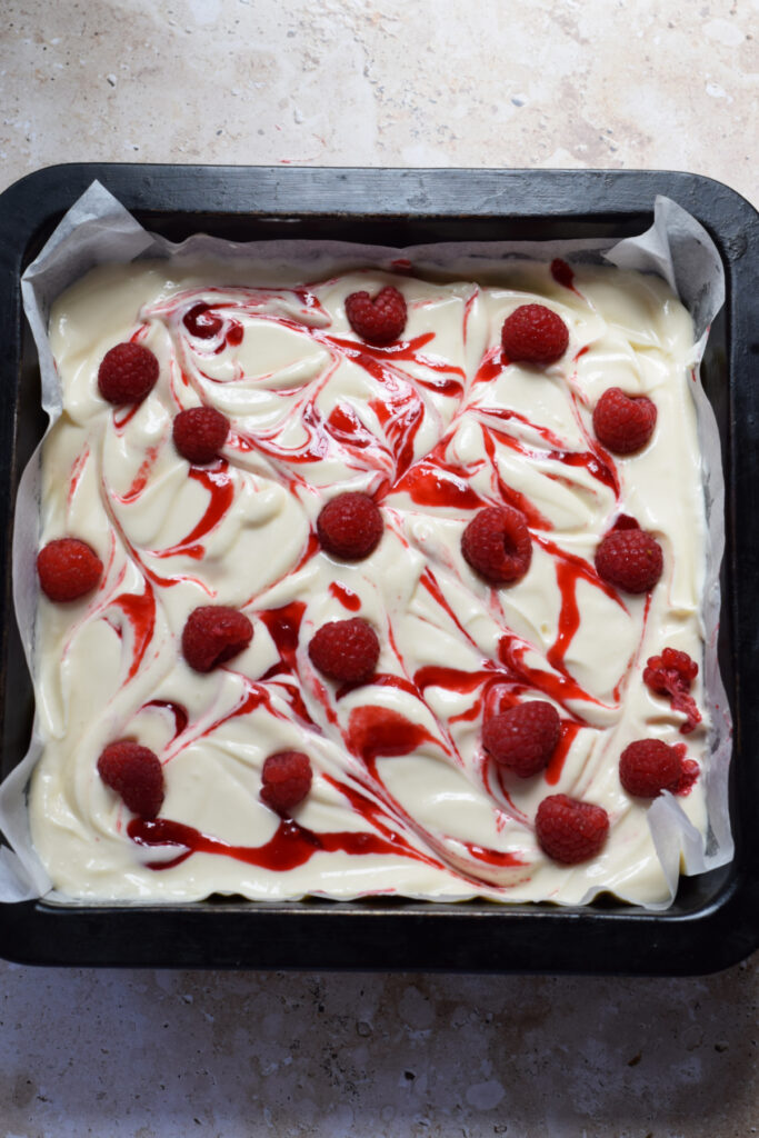 Ready to bake raspberry cheesecake bars.