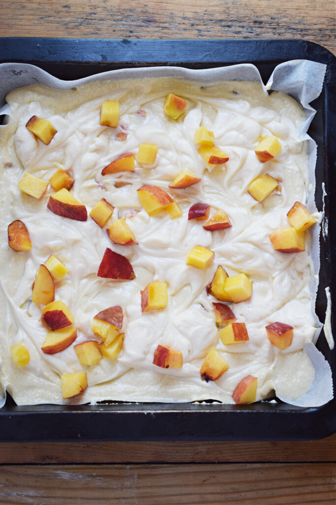 Peach cake ready to bake.