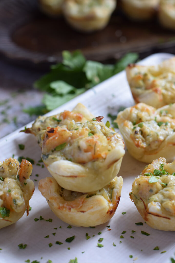 Close up of shrimp puff pastry appetizers.
