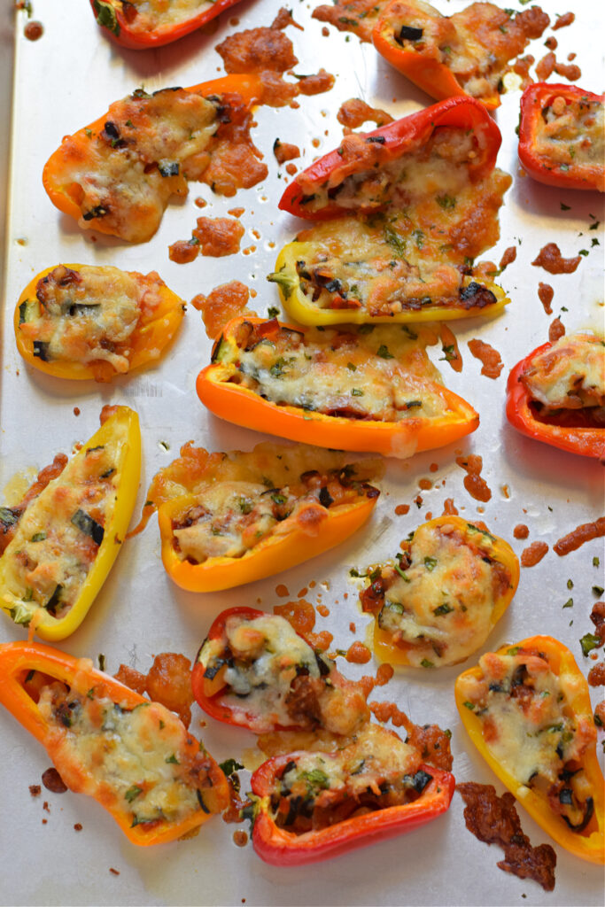 Baked peppers on a tray.