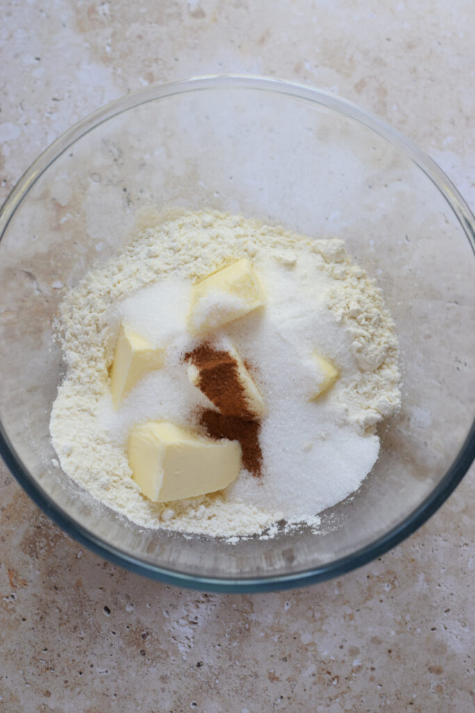 Ingredients in a glass bowl for a cookie base.