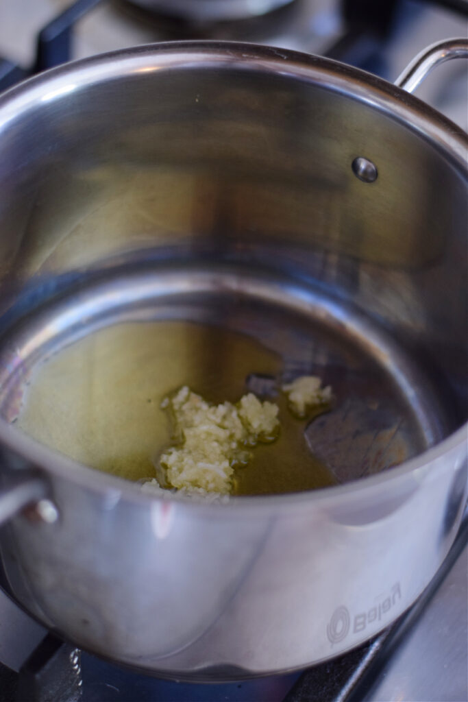 Cooking garlic in olive oil.