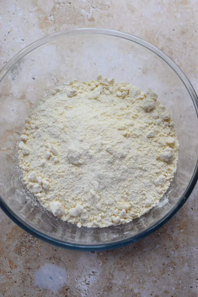 Scone crumble in a glass bowl.
