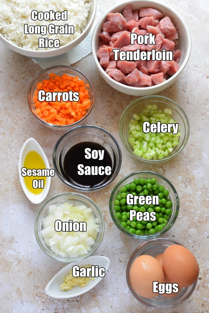Ingredients to make pork fried rice.