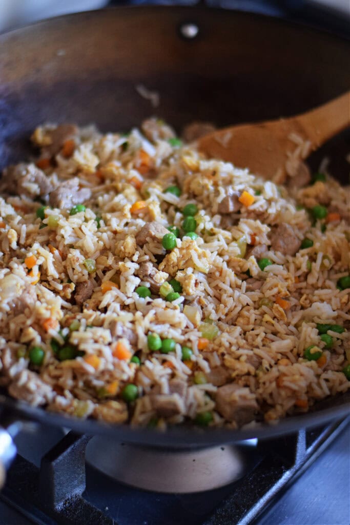 Pork fried rice in a wok.